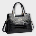 Olivia - Glänzende Handtasche mit Krokodilprägung