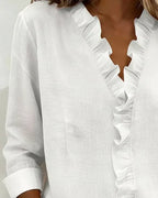 Indie | Bluse mit Rüschen, V-Ausschnitt und langen Ärmeln" 

Rewritten: "Indie | Ruffled Blouse with V-Neck and Long Sleeves