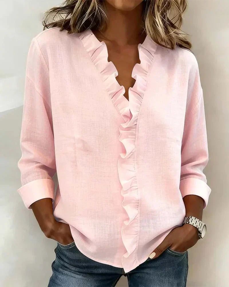 Indie | Bluse mit Rüschen, V-Ausschnitt und langen Ärmeln" 

Rewritten: "Indie | Ruffled Blouse with V-Neck and Long Sleeves