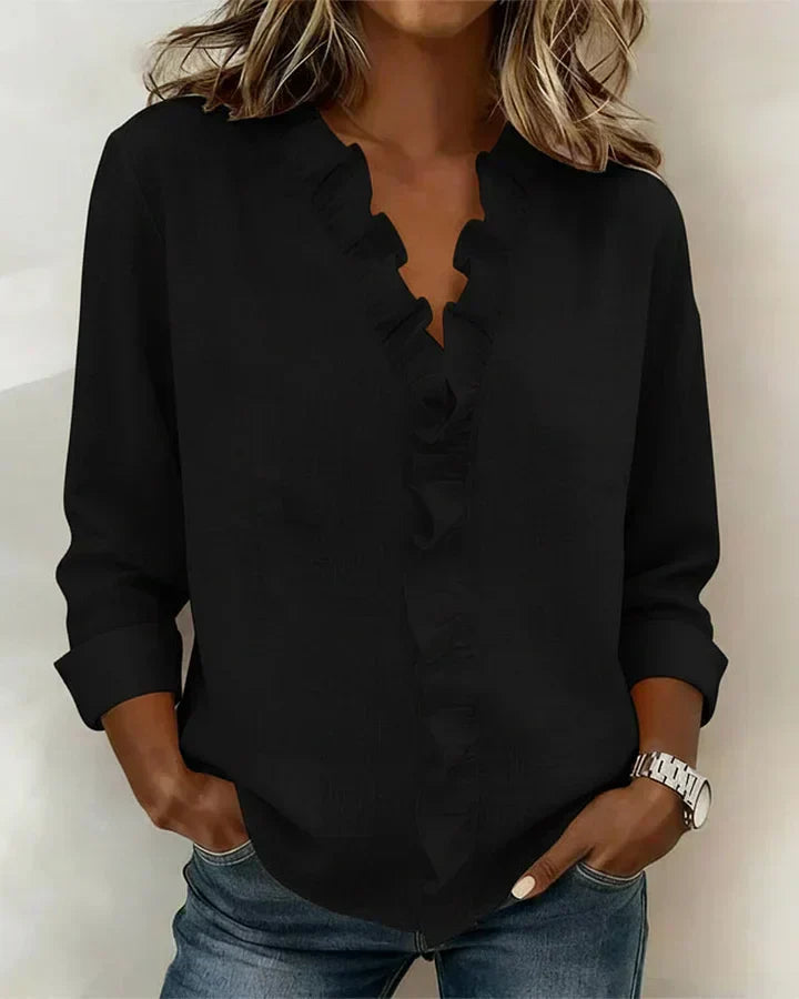 Indie | Bluse mit Rüschen, V-Ausschnitt und langen Ärmeln" 

Rewritten: "Indie | Ruffled Blouse with V-Neck and Long Sleeves