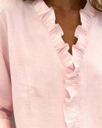 Indie | Bluse mit Rüschen, V-Ausschnitt und langen Ärmeln" 

Rewritten: "Indie | Ruffled Blouse with V-Neck and Long Sleeves
