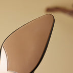 "Marloe Spitz zulaufende Leder-Mules" could be rewritten as "Marloe Elegante Leder-Mules mit spitz zulaufendem Design".